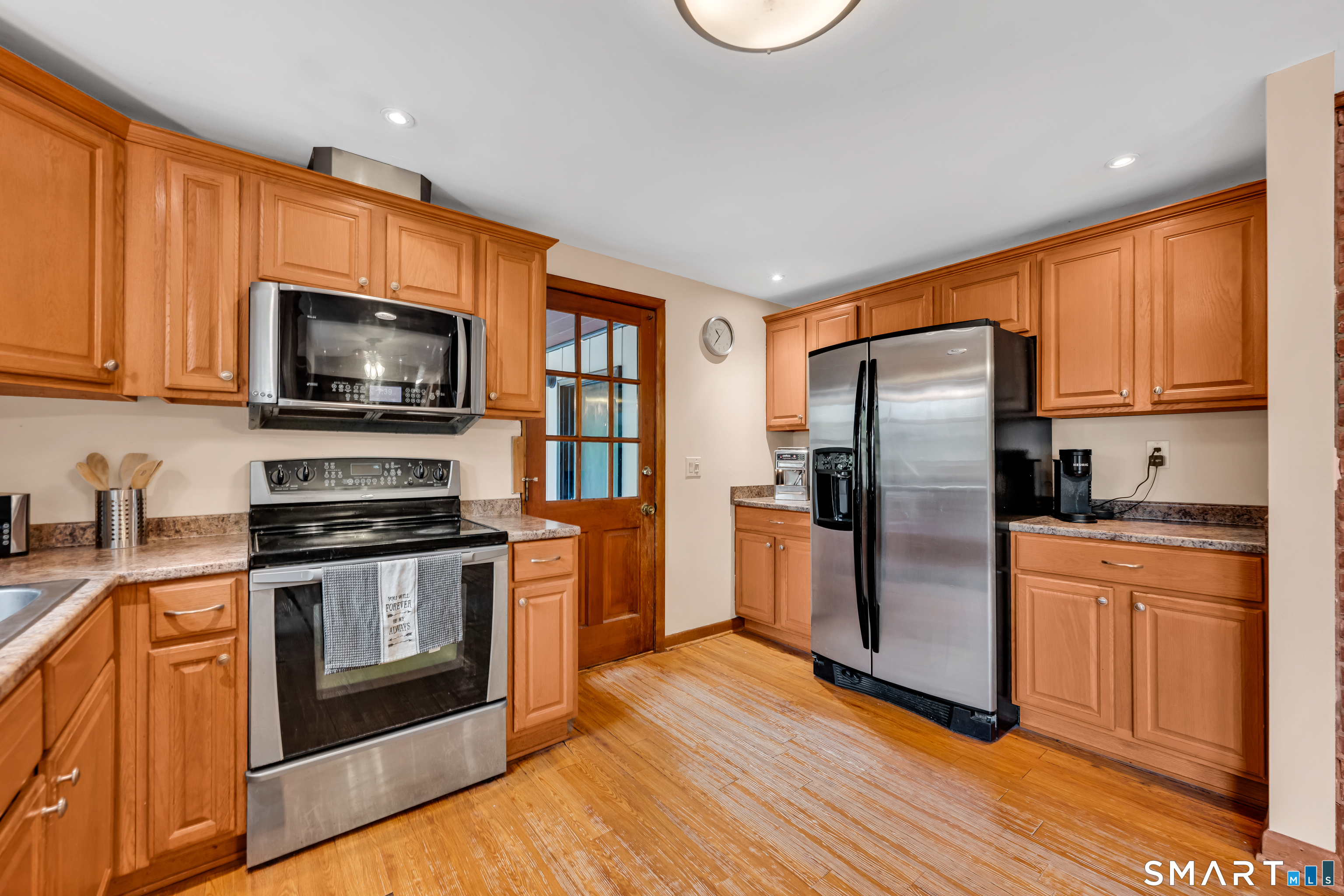 85 Timothy Road Naugatuck, CT 06770 - Photo 7 of 30 a kitchen with stainless steel appliances granite countertop a refrigerator stove and sink