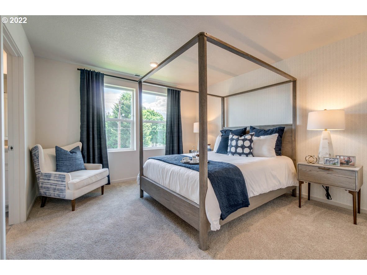 2912 V Street Springfield, OR 97477 - Photo 17 of 22 a bed room with a bed and a couch
