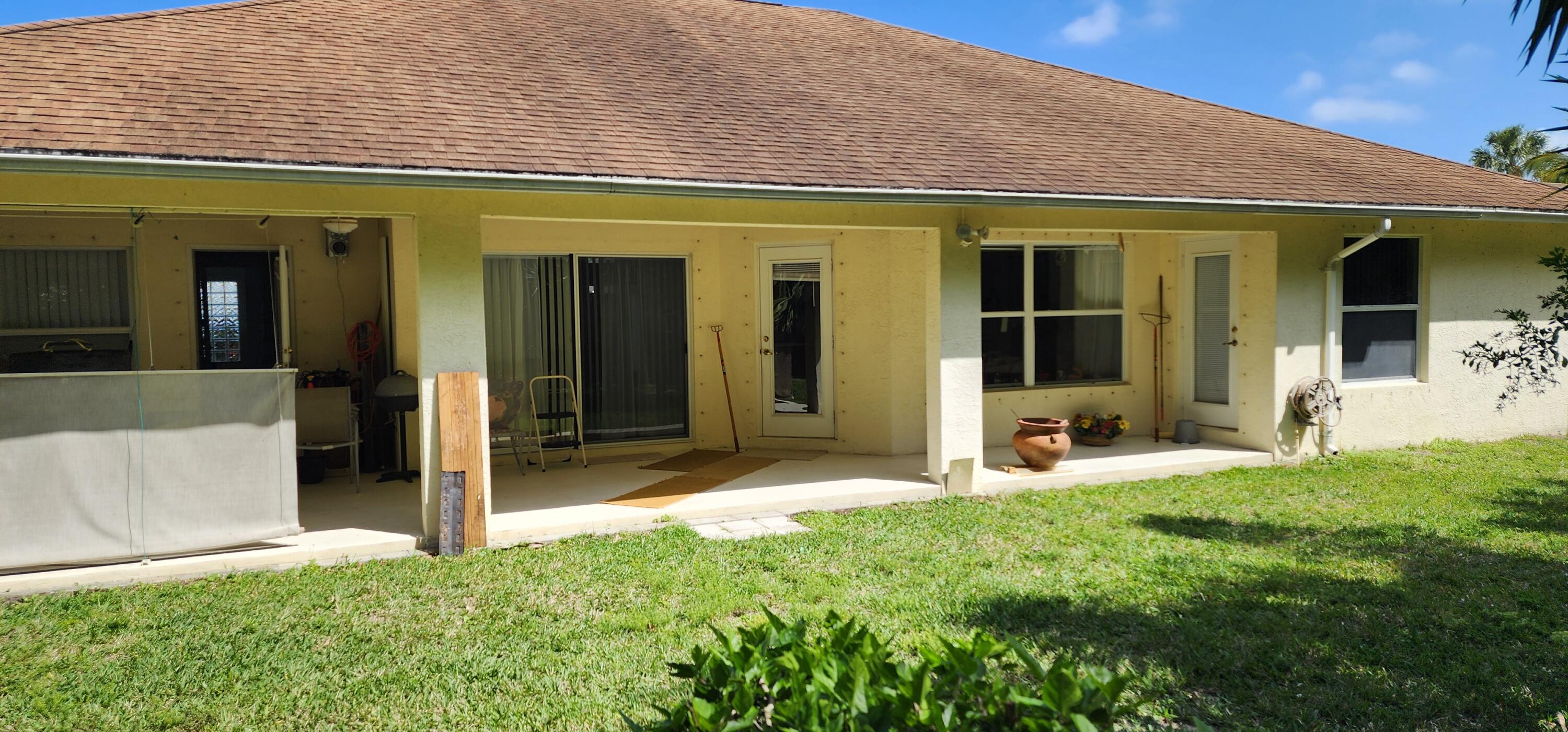 602 Weldwood Road Jupiter, FL 33458 - Photo 2 of 18 Back of House
