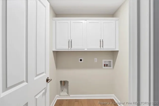 a view of cabinets and window