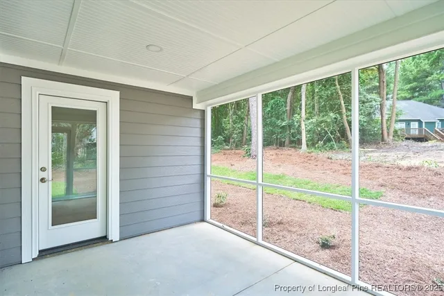 a view of an empty room and window
