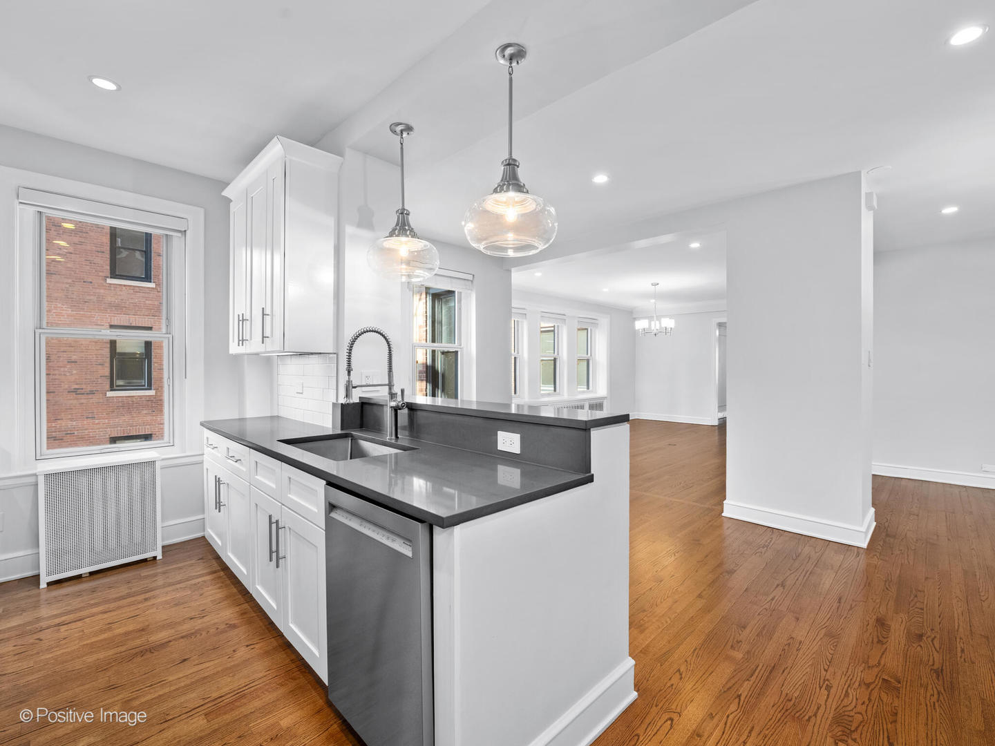 3240 North Lake Shore Drive, Unit 11B Chicago, IL 60657 - Photo 12 of 25 a kitchen with sink and window