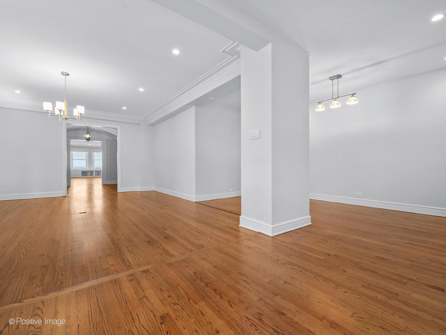 3240 North Lake Shore Drive, Unit 11B Chicago, IL 60657 - Photo 13 of 25 a view of empty room with wooden floor