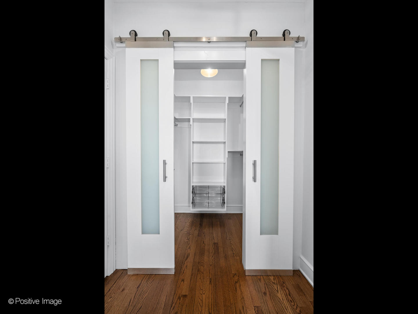 3240 North Lake Shore Drive, Unit 11B Chicago, IL 60657 - Photo 17 of 25 a view of hallway with wooden floor
