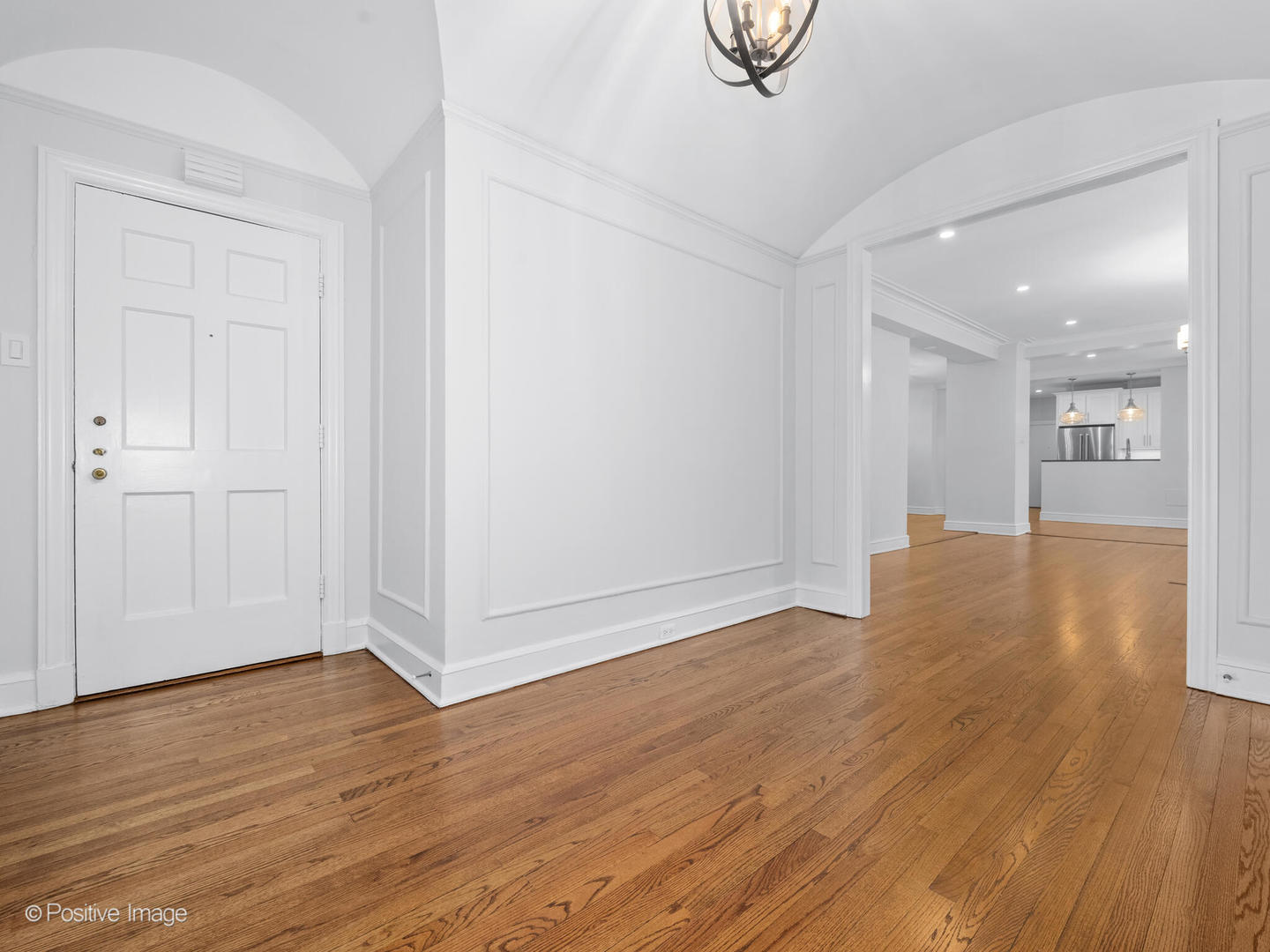 3240 North Lake Shore Drive, Unit 11B Chicago, IL 60657 - Photo 6 of 25 a view of an empty room with wooden floor