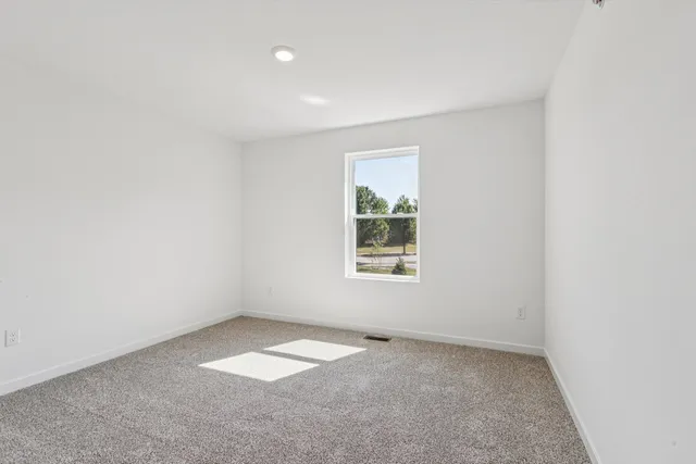 an empty room with a window