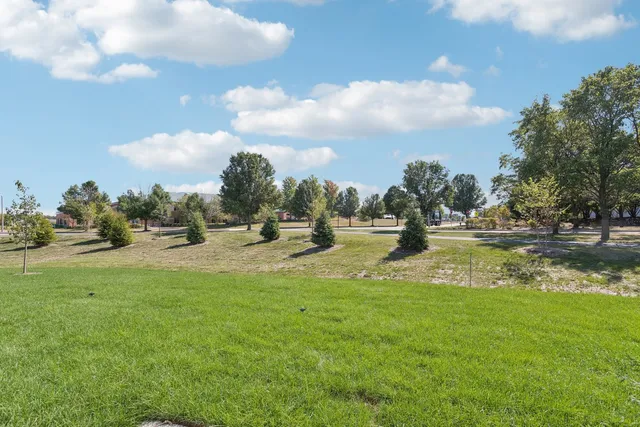 a view of swimming pool with outdoor seating