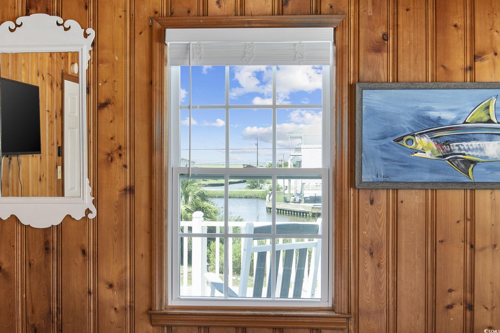 222 Calhoun Drive Murrells Inlet, SC 29576 - Photo 12 of 40 Room details featuring a water view and wood walls