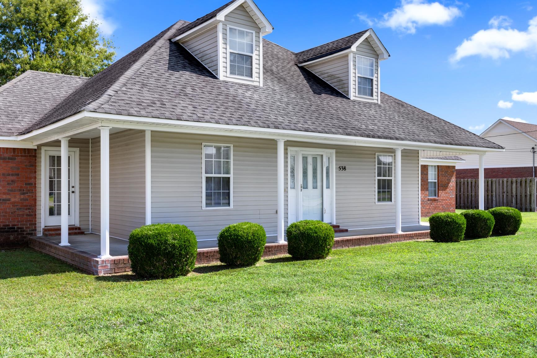 538 Rosemark Road Atoka, TN 38004 - Photo 2 of 25 a view of a house with a yard and porch