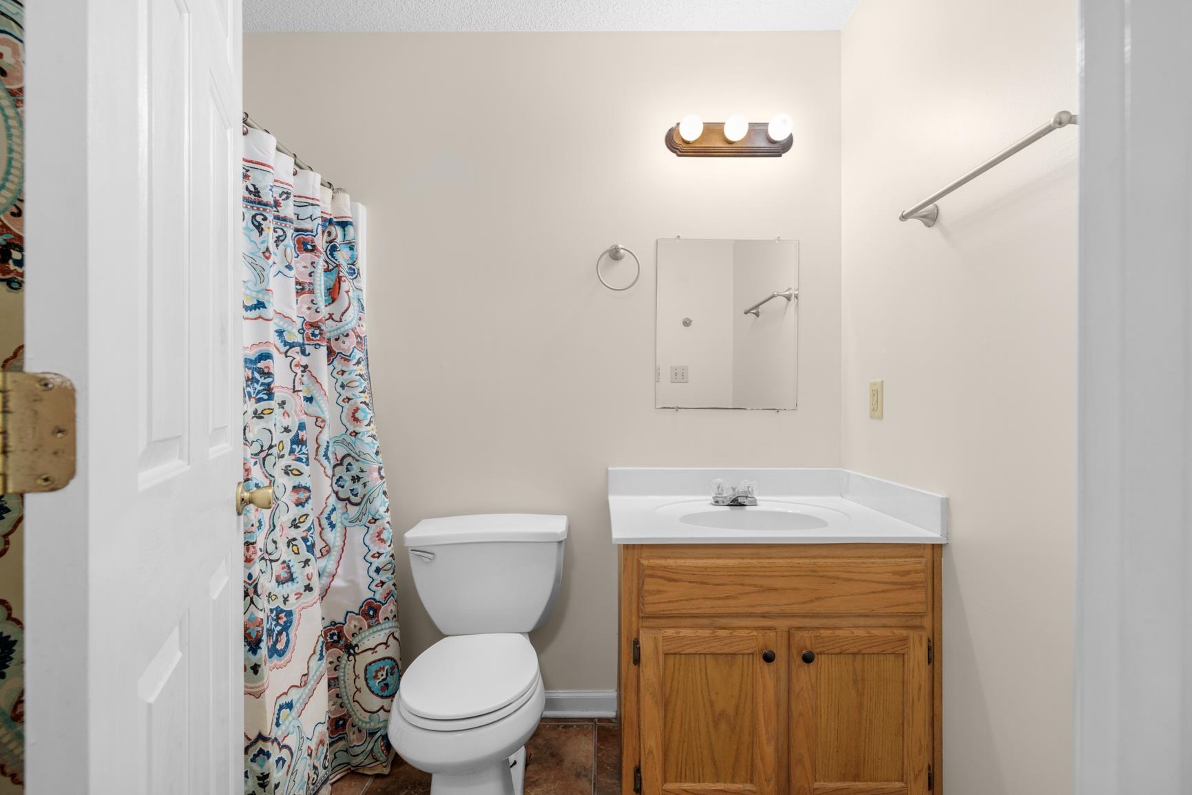 538 Rosemark Road Atoka, TN 38004 - Photo 23 of 25 a bathroom with a sink a toilet a shower and a mirror
