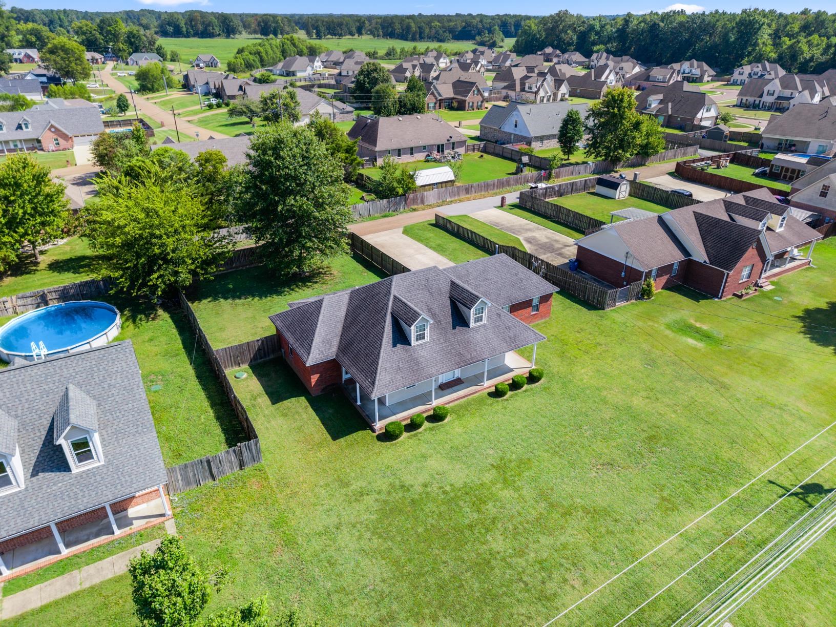 538 Rosemark Road Atoka, TN 38004 - Photo 8 of 25 an aerial view of a house with a swimming pool yard and outdoor seating