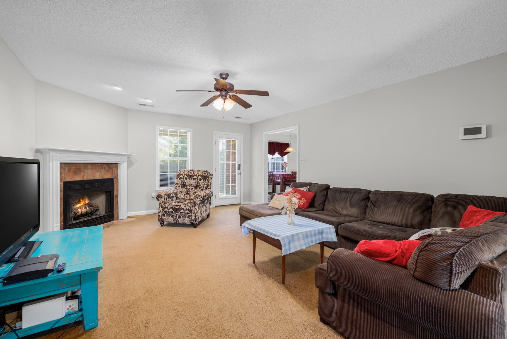 538 Rosemark Road Atoka, TN 38004 - Photo 10 of 25 a living room with furniture and a fireplace