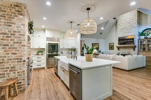 a bathroom with a sink and mirror