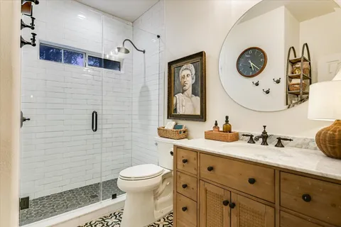 a bed room with a bed and a chandelier