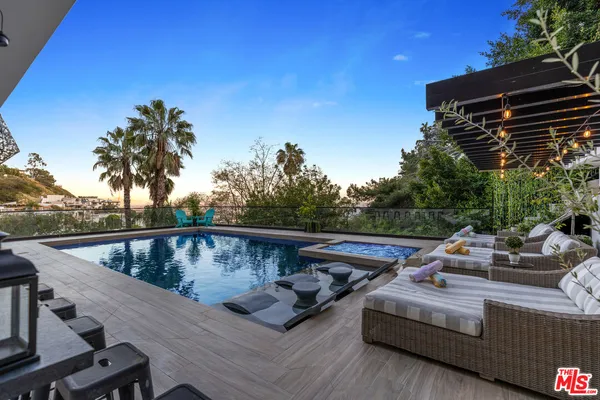 a view of sitting area in the backyard