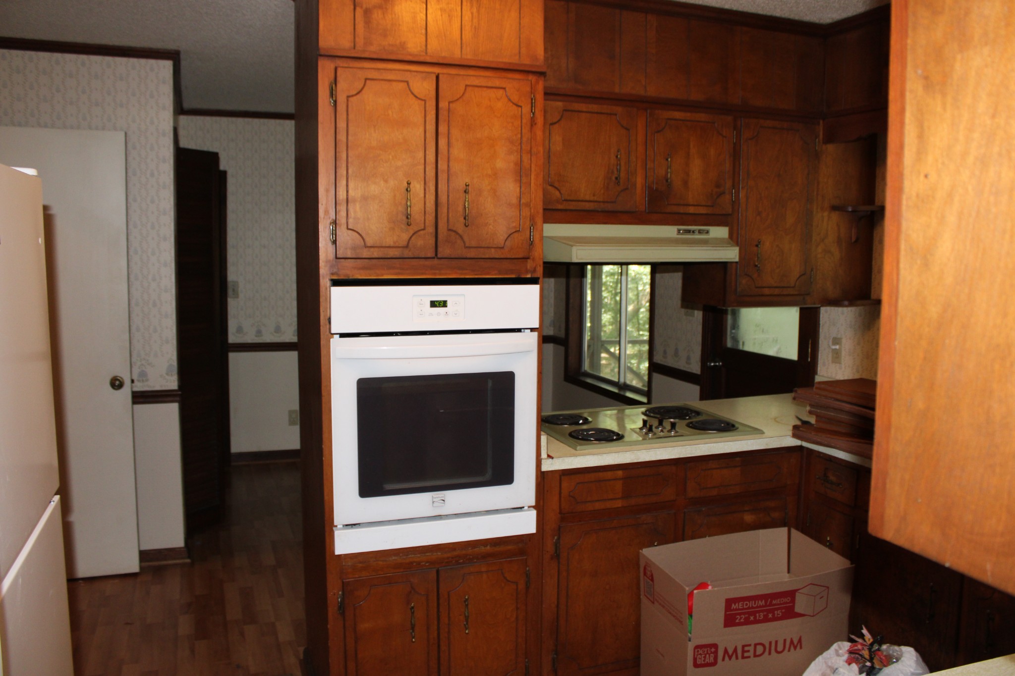 200 Primrose Lane Morrison, TN 37357 - Photo 16 of 53 a kitchen with stainless steel appliances granite countertop a stove and a refrigerator