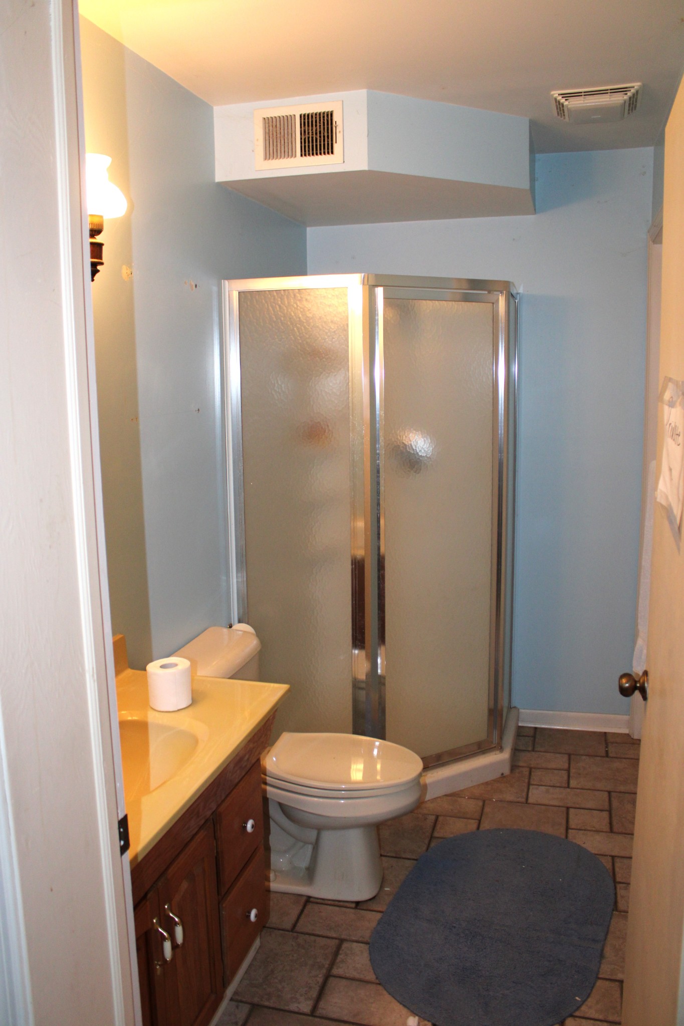 200 Primrose Lane Morrison, TN 37357 - Photo 29 of 53 a bathroom with a granite countertop toilet a sink and a mirror