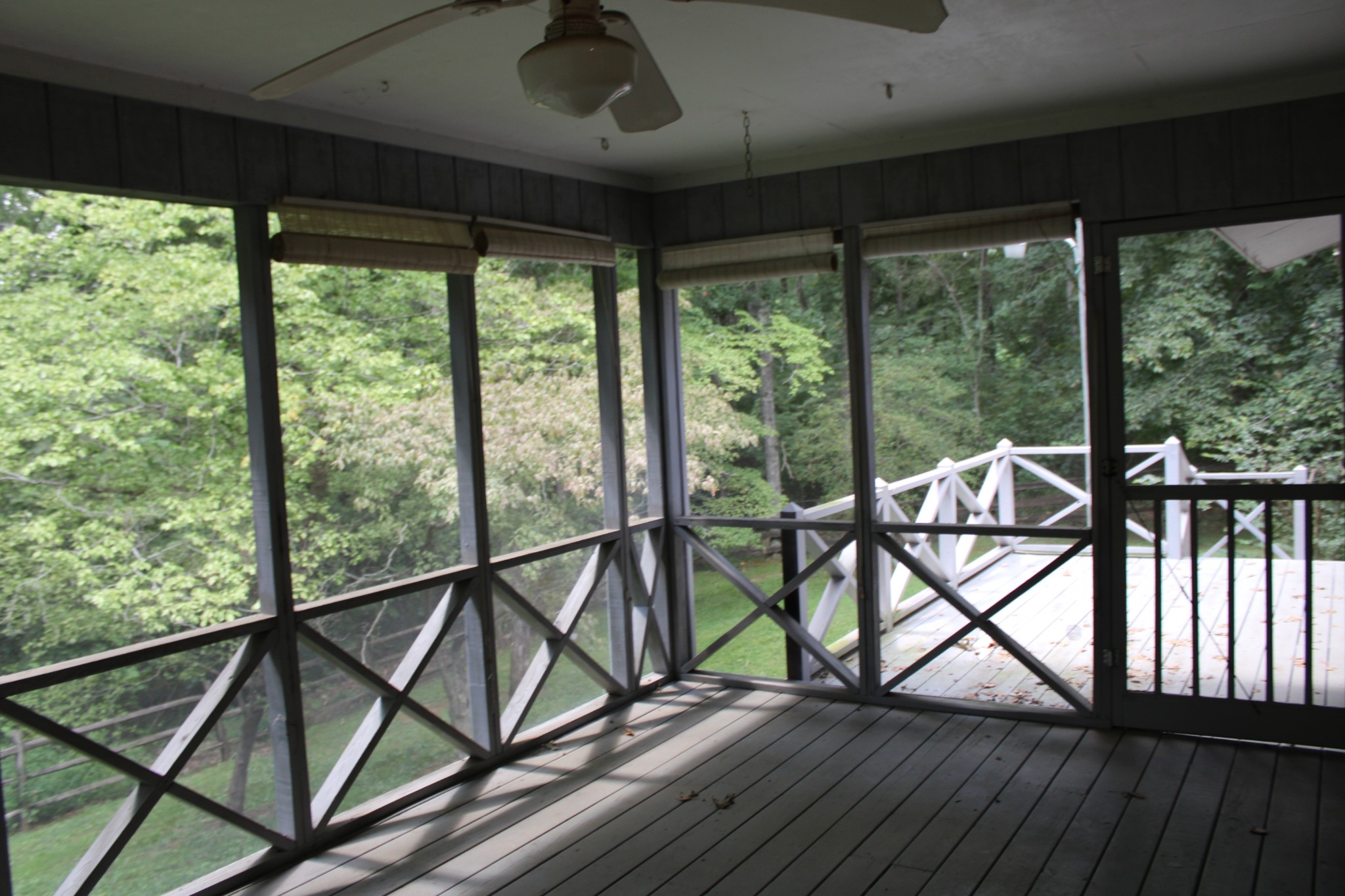 200 Primrose Lane Morrison, TN 37357 - Photo 45 of 53 a view of a balcony with chairs and wooden floor