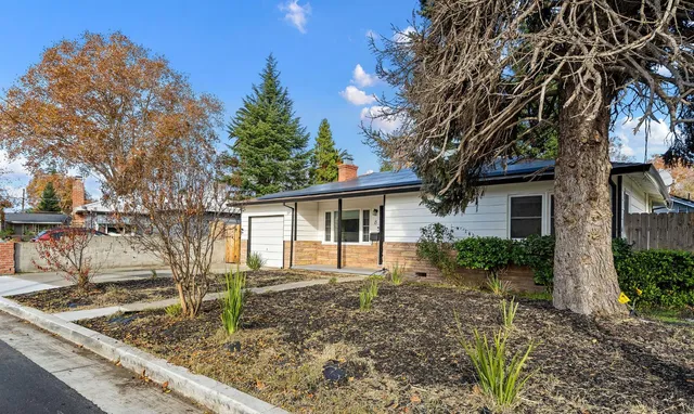 a house view with a outdoor space
