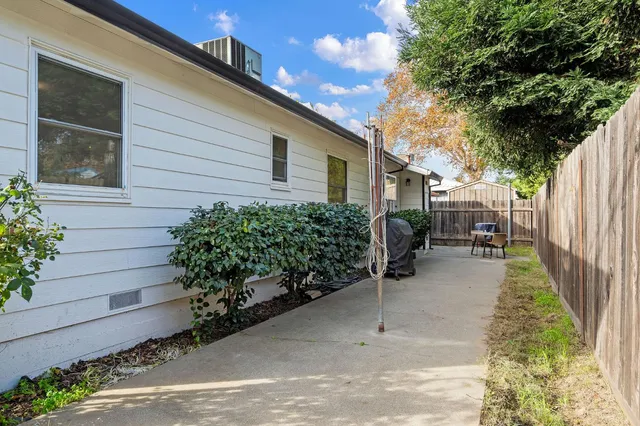 a backyard of a house with lots of green space