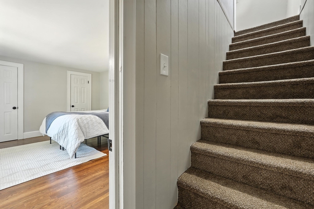 706 Allen Street Springfield, MA 01118 - Photo 21 of 33 a bed room with a bed and a window