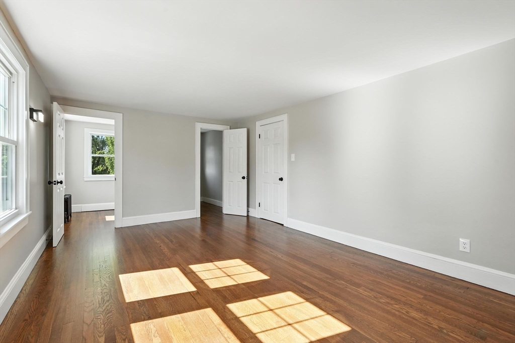 706 Allen Street Springfield, MA 01118 - Photo 24 of 33 wooden floor in an empty room with a window