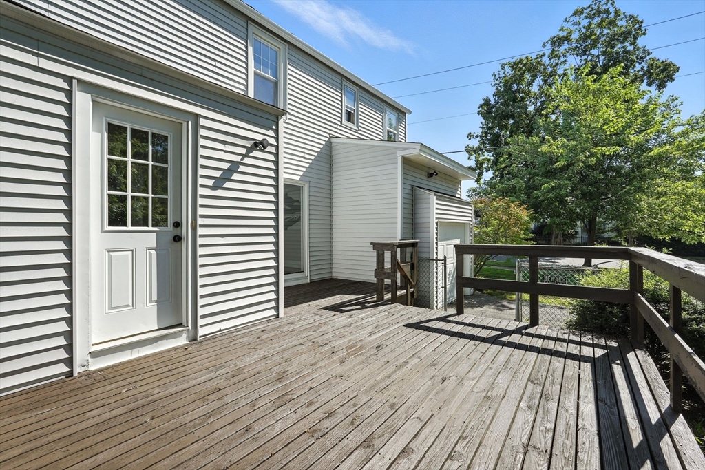 706 Allen Street Springfield, MA 01118 - Photo 29 of 33 a view of outdoor space with deck and furniture