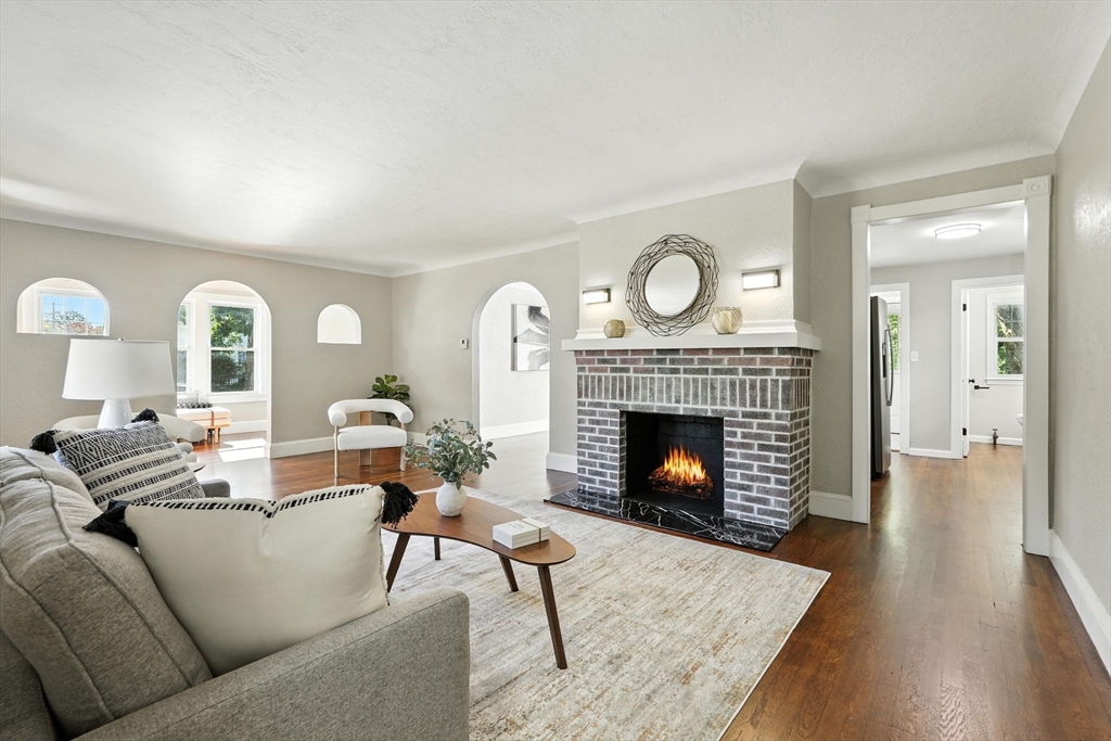 706 Allen Street Springfield, MA 01118 - Photo 3 of 33 a living room with furniture and a fireplace