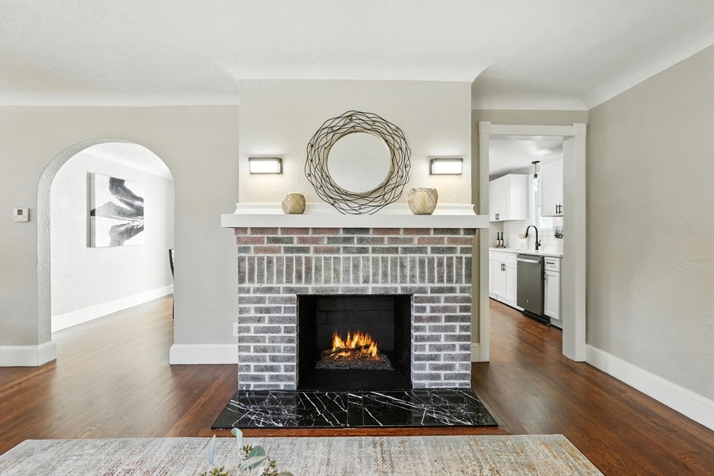 706 Allen Street Springfield, MA 01118 - Photo 6 of 33 a living room with furniture and a fireplace