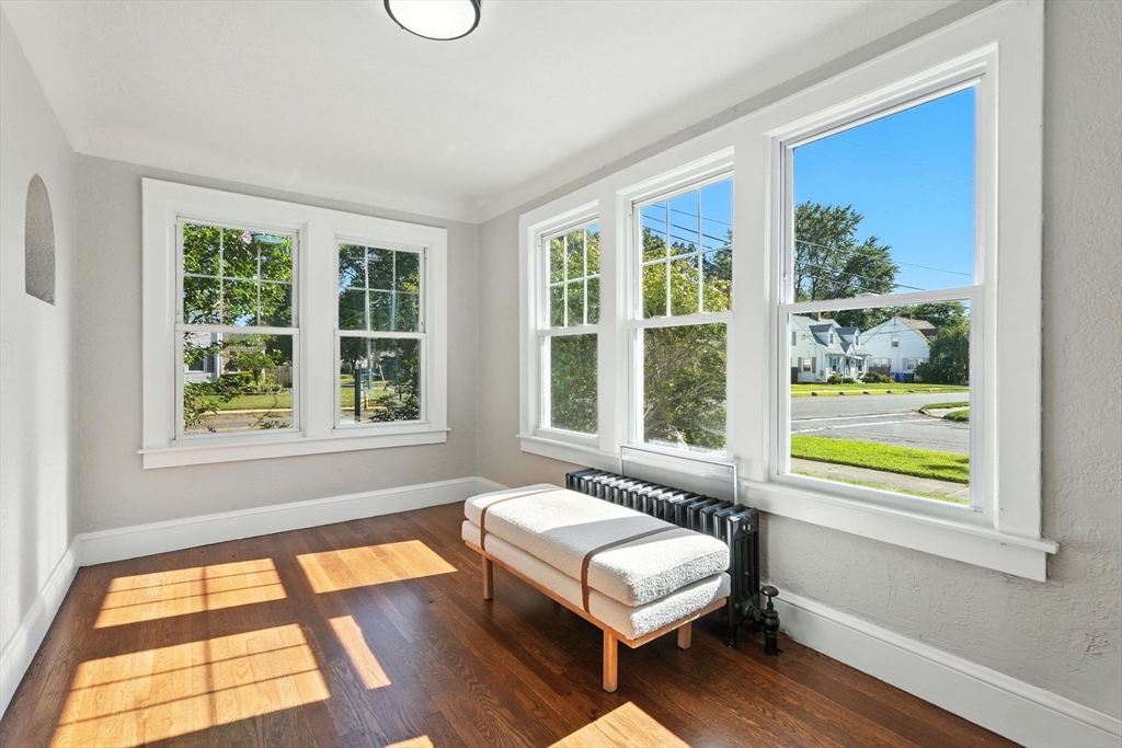 706 Allen Street Springfield, MA 01118 - Photo 10 of 33 a living room with couch and a window