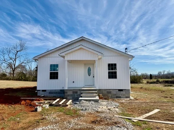 a front view of house with yard