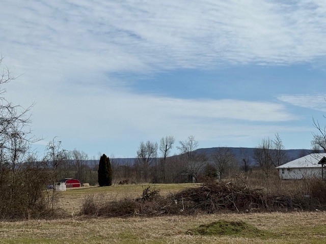 3336 Oak Grove Road Decherd, TN 37324 - Photo 2 of 21 a view of a house with a mountain