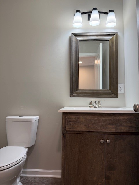 3336 Oak Grove Road Decherd, TN 37324 - Photo 4 of 21 a bathroom with a toilet sink and mirror
