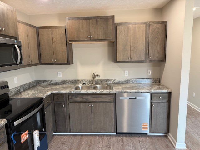 3336 Oak Grove Road Decherd, TN 37324 - Photo 6 of 21 a kitchen with a sink and cabinets