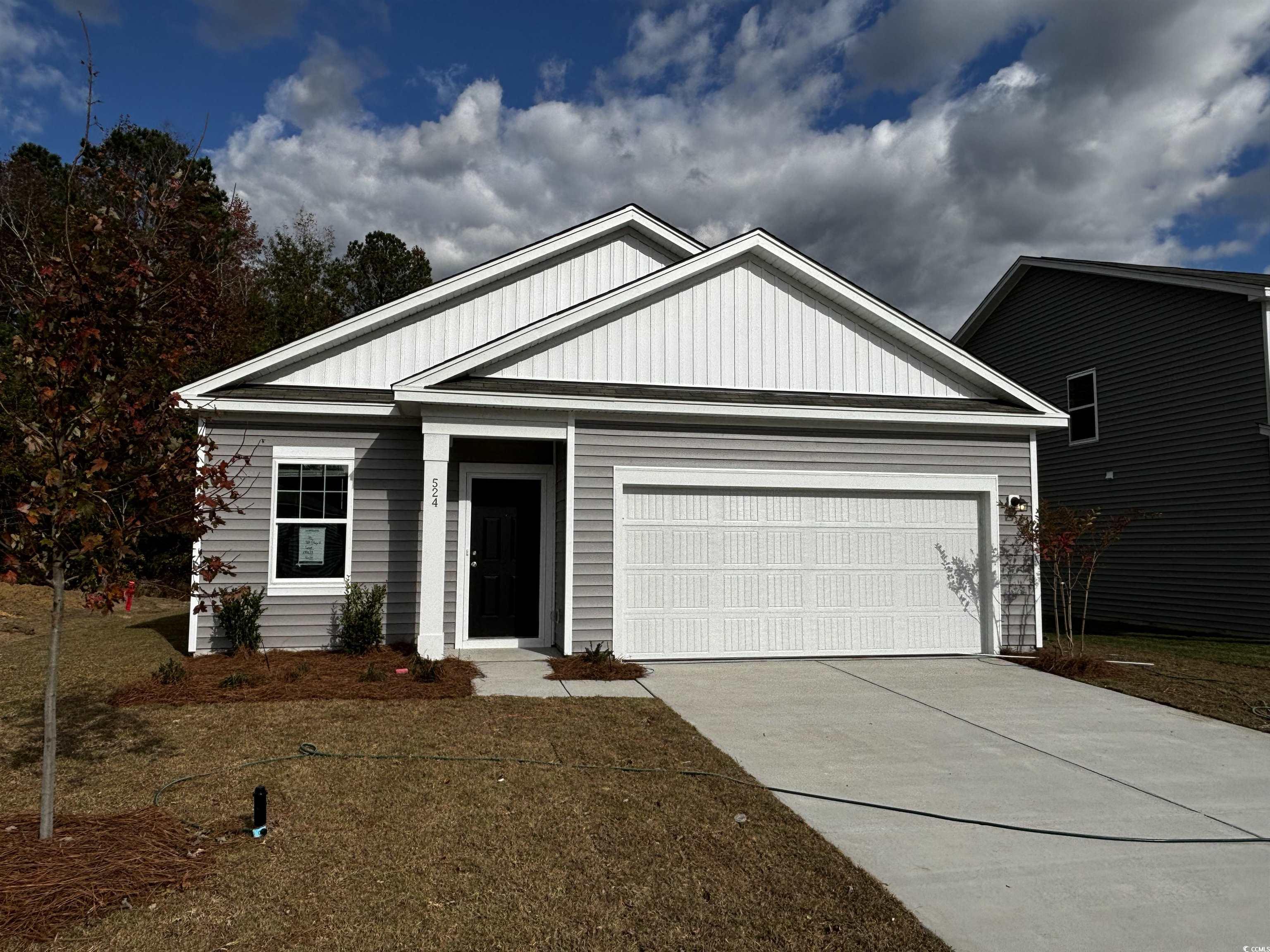 524 Tillage Court Conway, SC 29526 - Photo 1 of 7 View of front of house with a garage