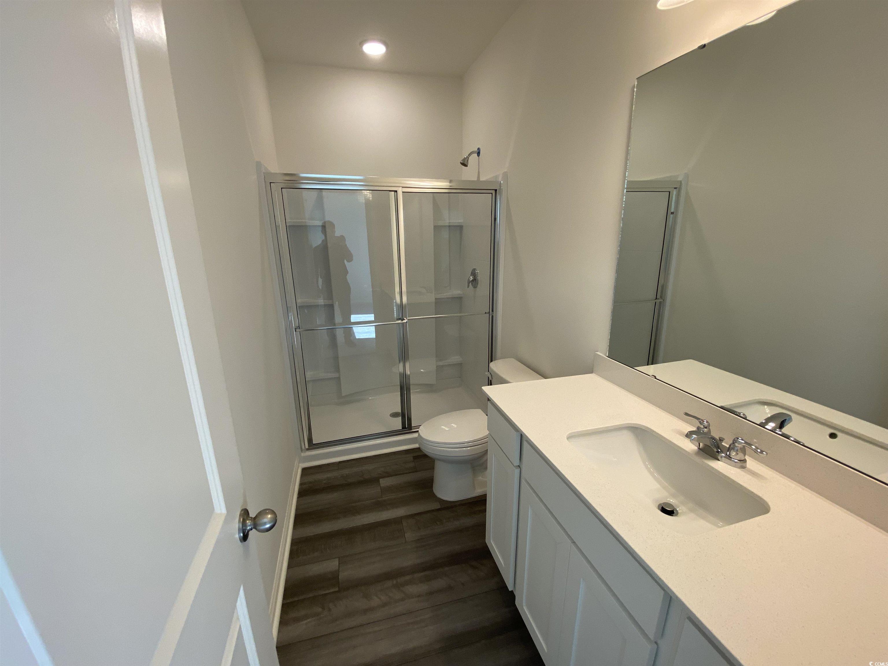 524 Tillage Court Conway, SC 29526 - Photo 5 of 7 Bathroom featuring hardwood / wood-style floors, v