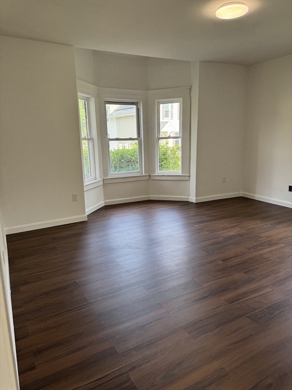 193 Freedom Street Athol, MA 01331 - Photo 13 of 37 an empty room with wooden floor and windows