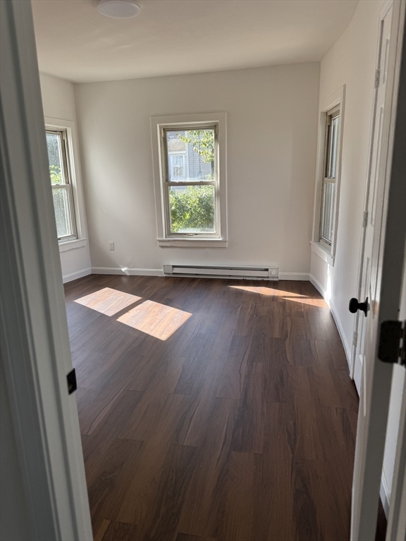 193 Freedom Street Athol, MA 01331 - Photo 15 of 37 an empty room with wooden floor and windows