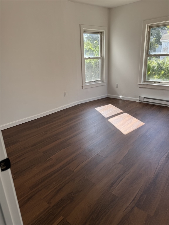 193 Freedom Street Athol, MA 01331 - Photo 25 of 37 an empty room with wooden floor and windows