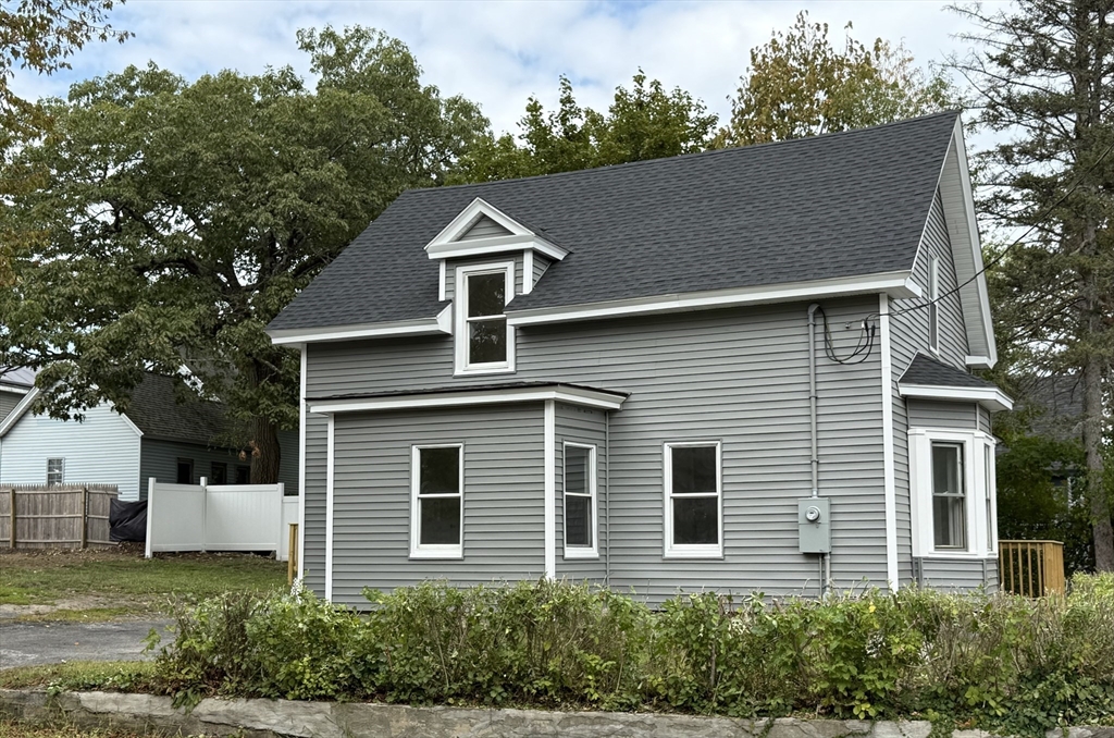 193 Freedom Street Athol, MA 01331 - Photo 3 of 37 a front view of a house with a yard