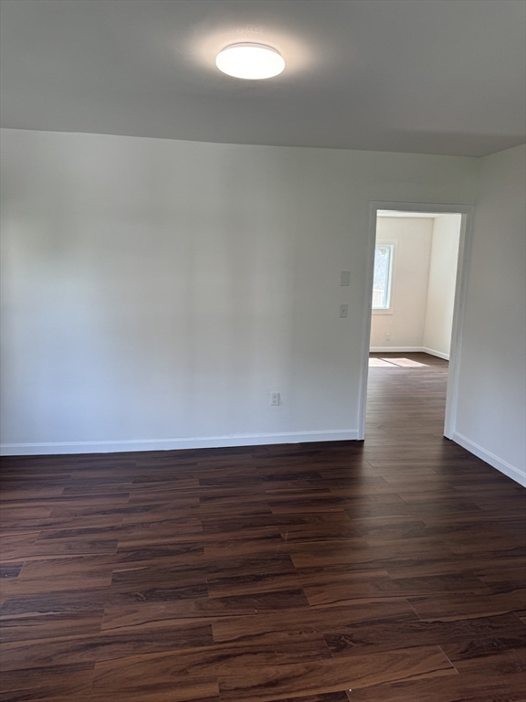 193 Freedom Street Athol, MA 01331 - Photo 31 of 37 a view of an empty room with wooden floor
