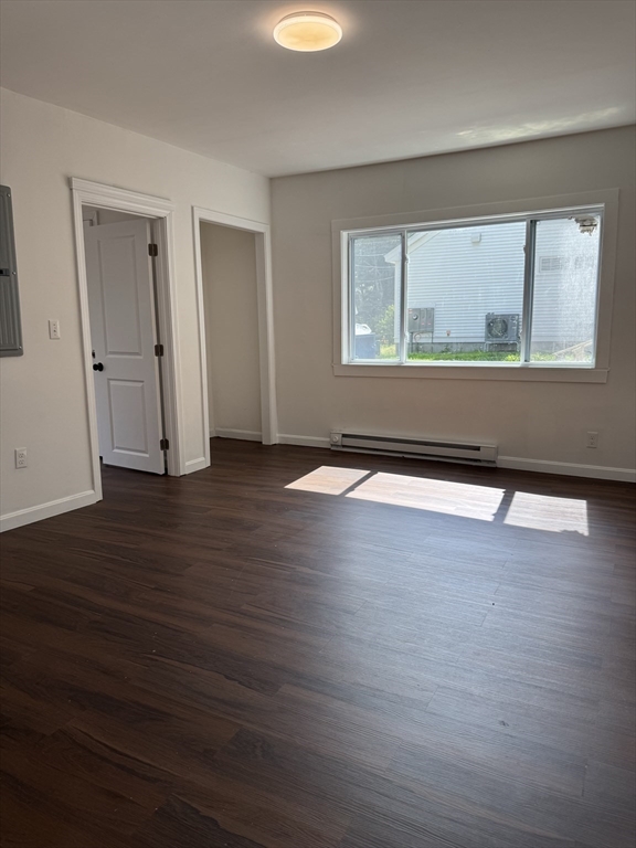 193 Freedom Street Athol, MA 01331 - Photo 34 of 37 an empty room with wooden floor and windows