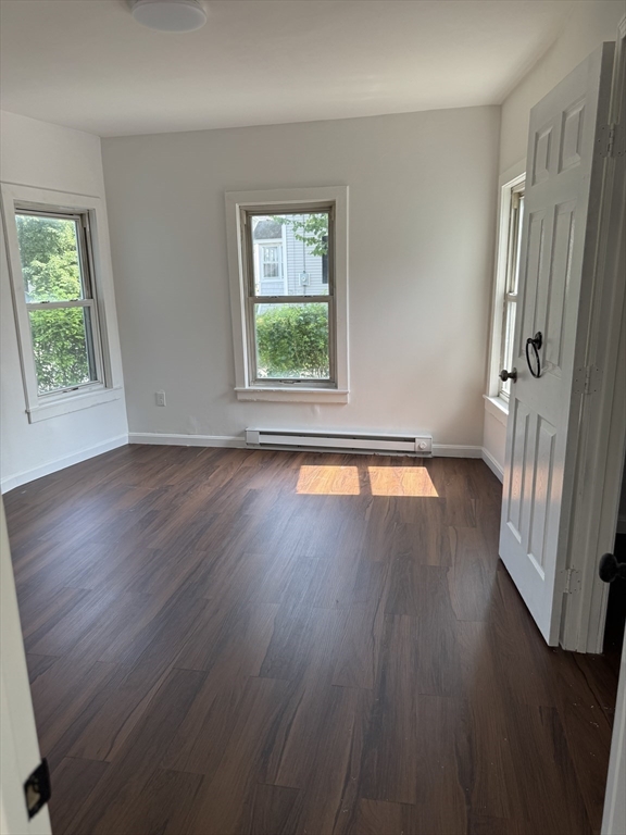 193 Freedom Street Athol, MA 01331 - Photo 37 of 37 an empty room with wooden floor and windows