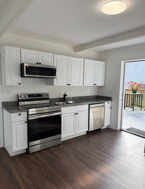 193 Freedom Street Athol, MA 01331 - Photo 10 of 37 a kitchen with granite countertop a stove and a sink