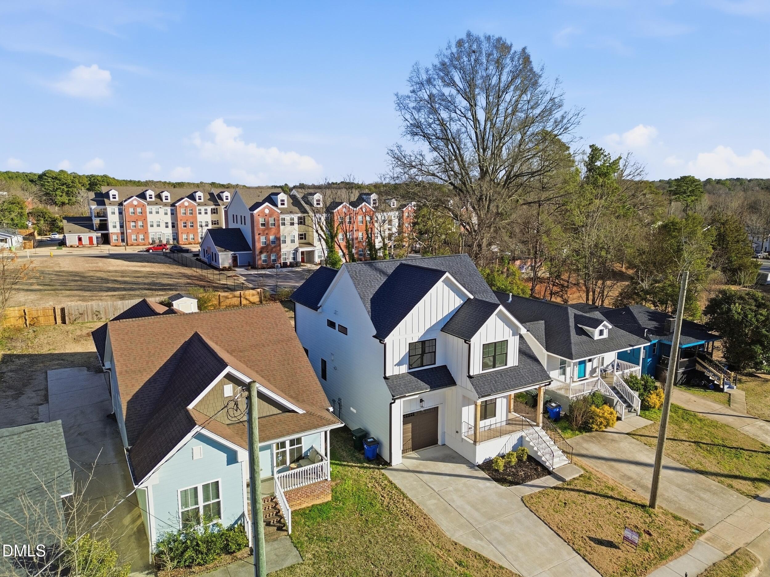 1439 Garner Road Raleigh, NC 27610 - Photo 19 of 37 a aerial view of a house with swimming pool and sitting area