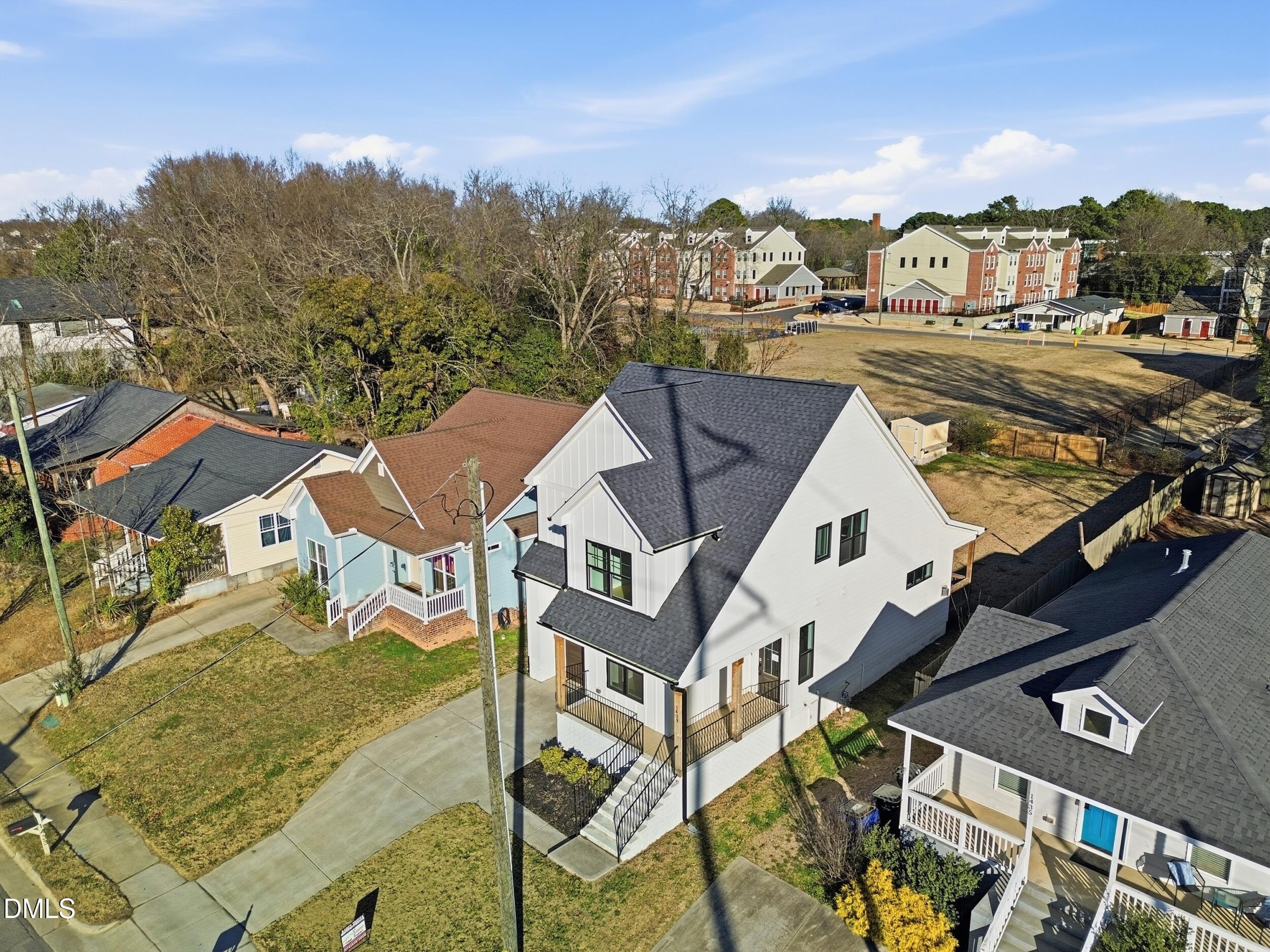 1439 Garner Road Raleigh, NC 27610 - Photo 20 of 37 a view of a city with tall buildings