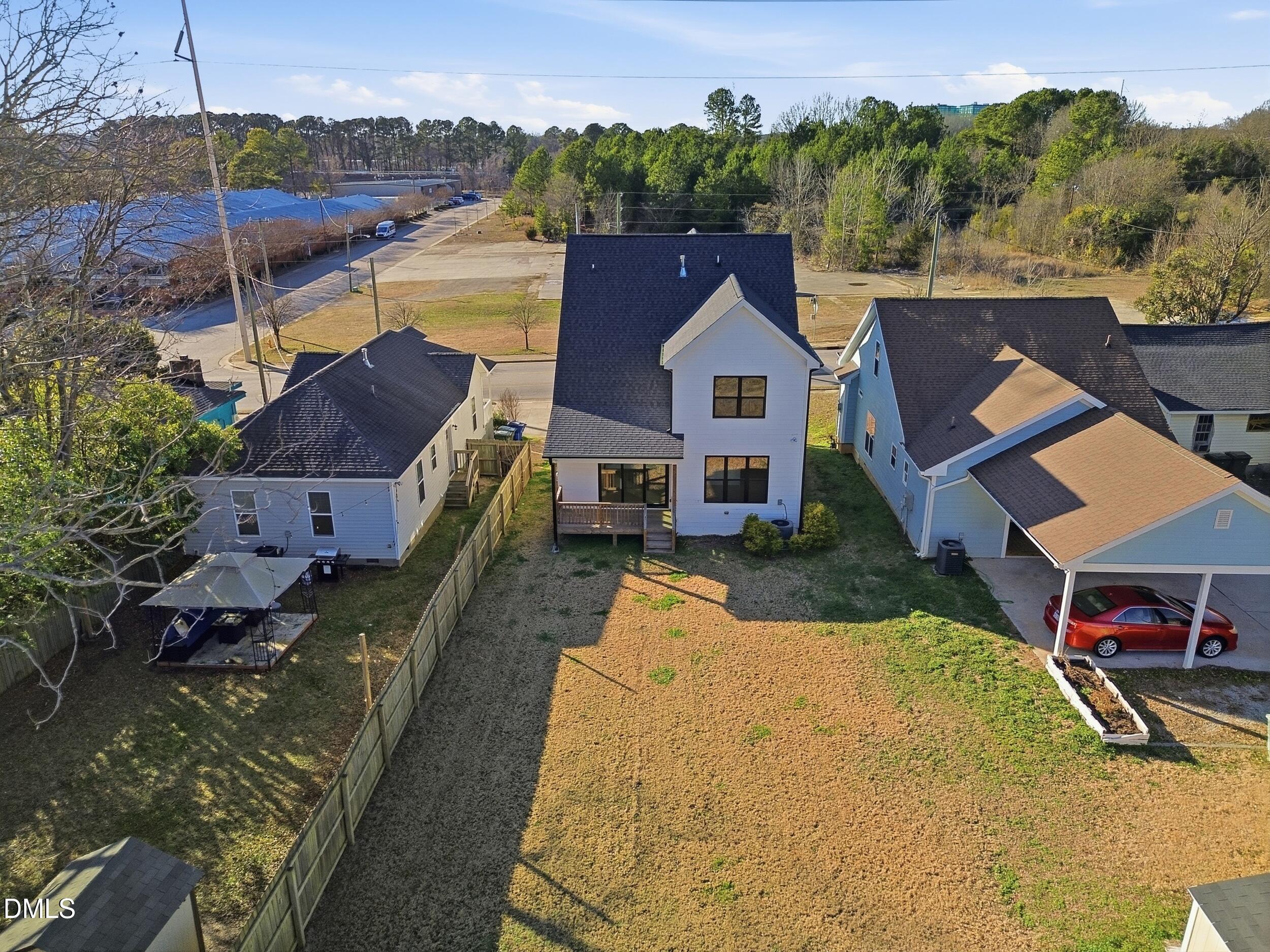 1439 Garner Road Raleigh, NC 27610 - Photo 21 of 37 a aerial view of a house with a yard