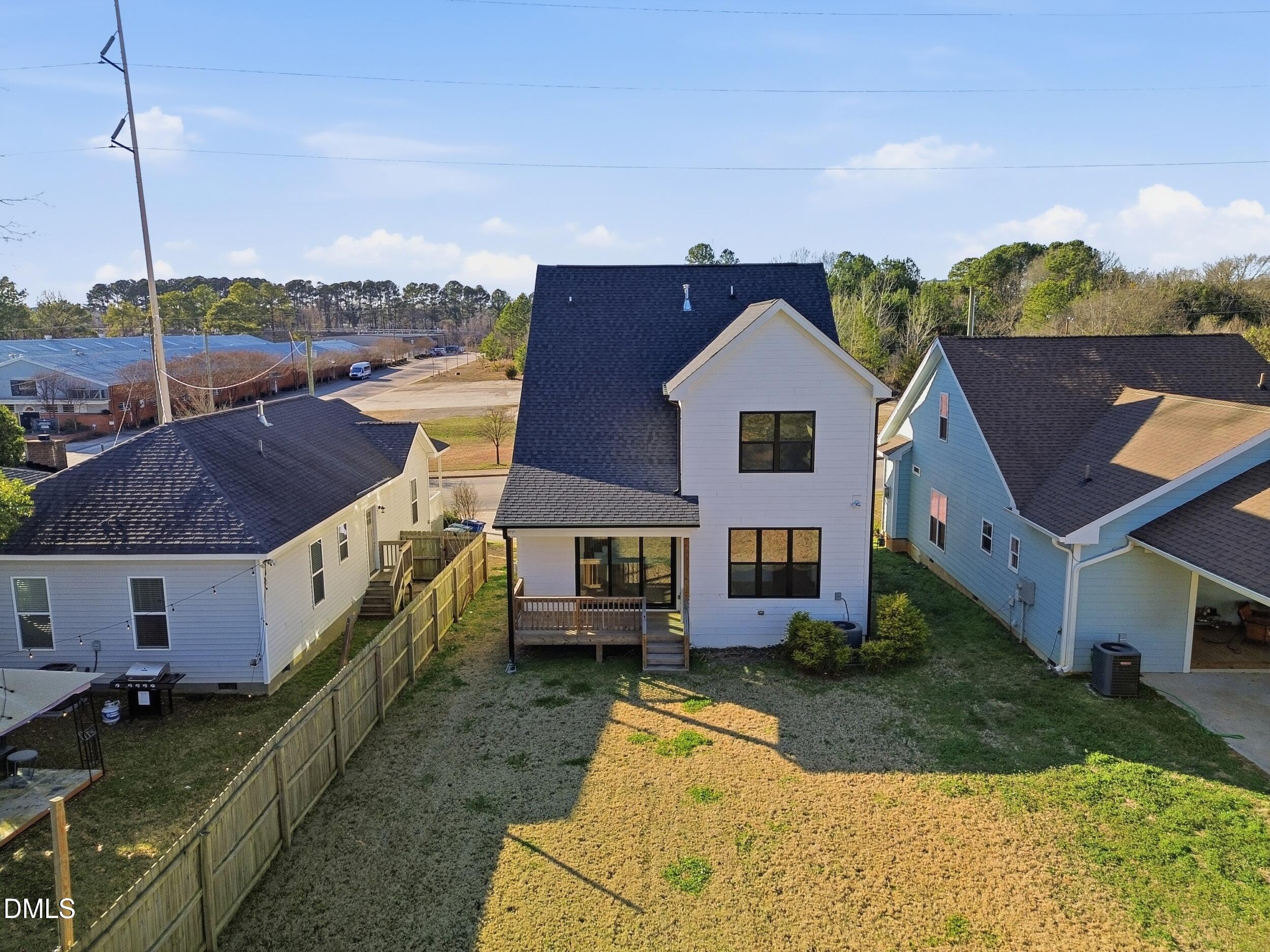1439 Garner Road Raleigh, NC 27610 - Photo 22 of 37 a aerial view of a house with a yard