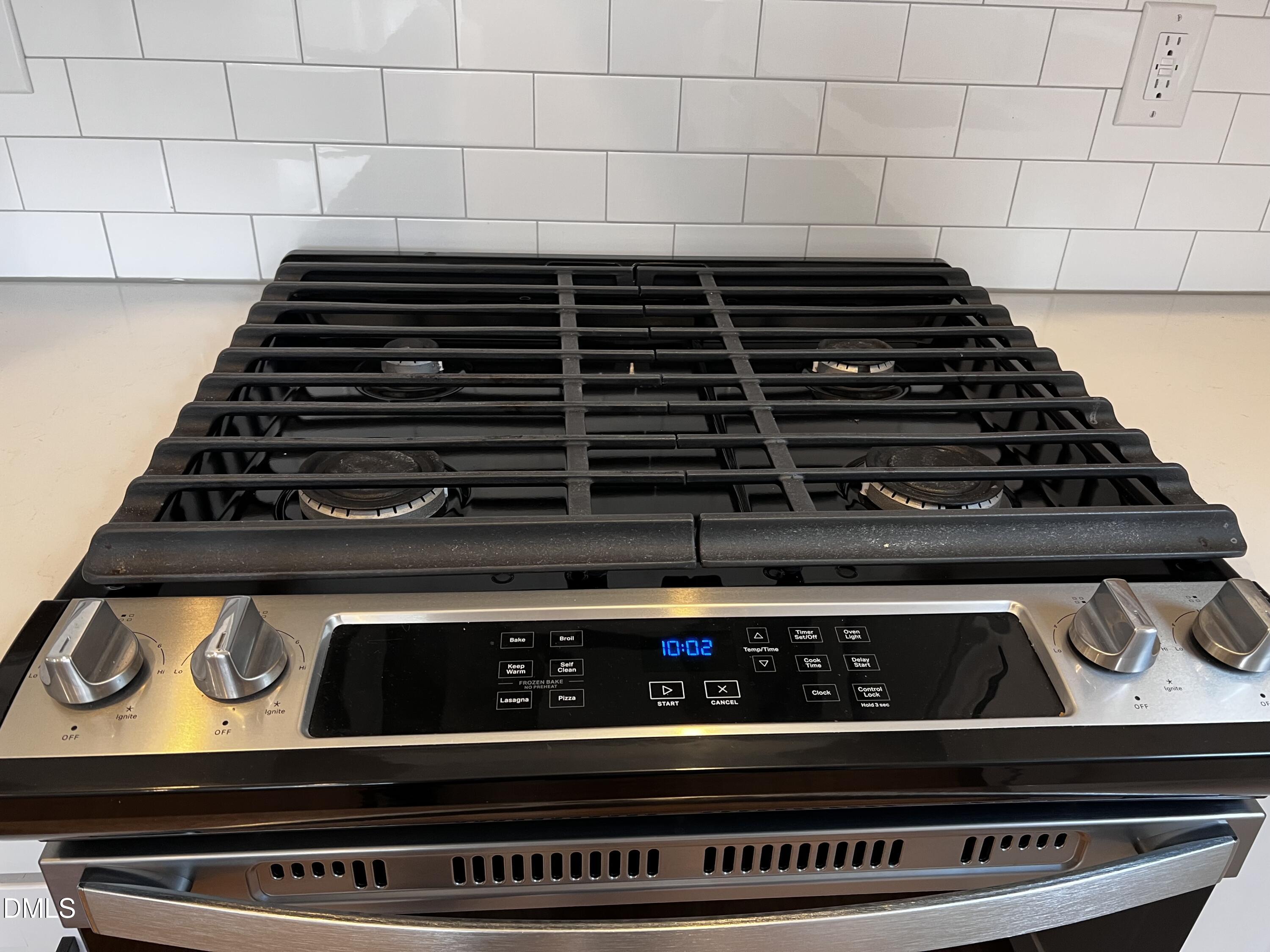 1439 Garner Road Raleigh, NC 27610 - Photo 23 of 28 a close view of stove top oven