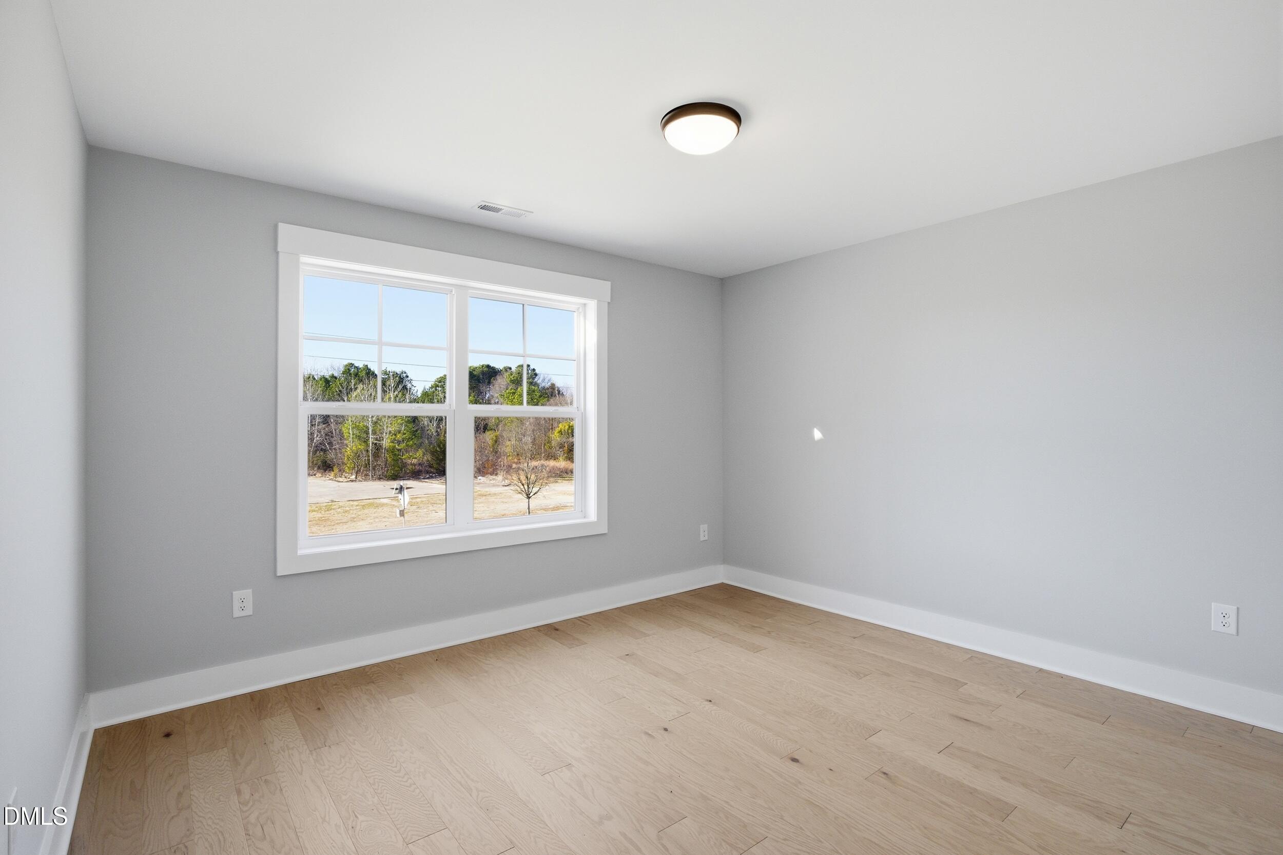 1439 Garner Road Raleigh, NC 27610 - Photo 24 of 37 an empty room with a window